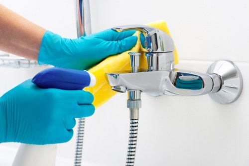 Carpet cleaning technician preparing equipment for a booking